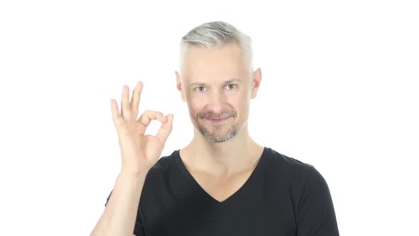 Okay Sign by Confident Middle Aged Man, White Background