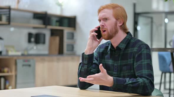 Angry Beard Redhead Man Talking on Smartphone