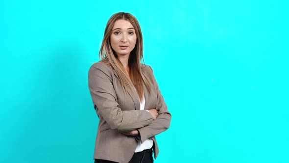 Profile Portrait of Excited Young Woman with Long Brown Hair, Looking Surprisingly at the Room