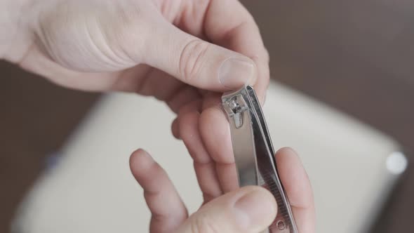 Personal Hygiene Clipping Fingernails with Tweezers