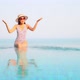 Young asian woman enjoy around outdoor swimming pool for leisure - VideoHive Item for Sale