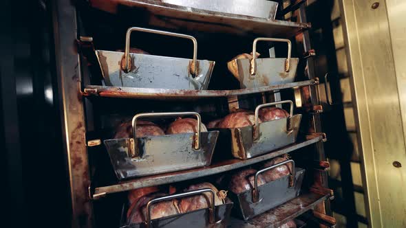 Meat Placed on the Trays in the Smoking Chamber