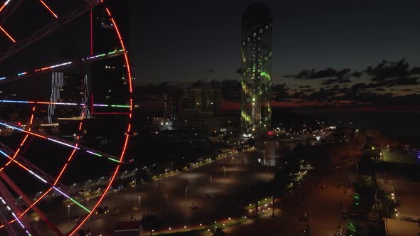 Batumi, Georgia - August 12 2020: Flying at night over the central boulevard in Batumi