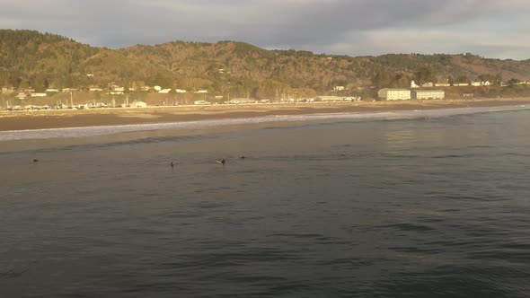 Drone view of surfers at the Oregon Coast.