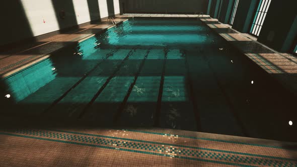 The View of an Empty Public Swimming Pool Indoors alt