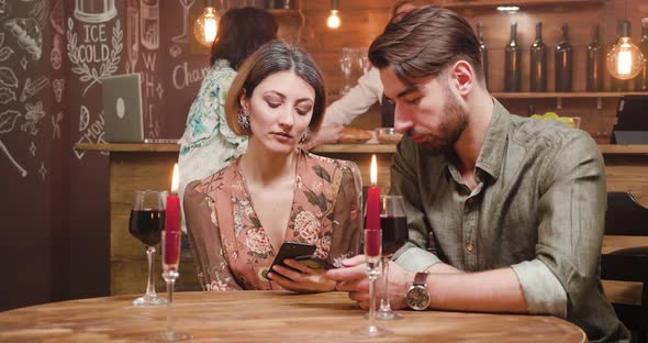 Couple Addicted To Social Media While on a Date