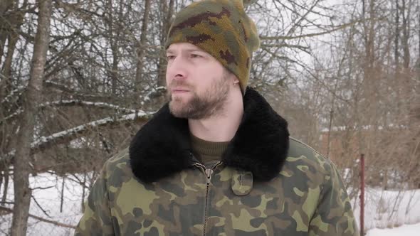 Portrait of Caucasian Man in Camouflage Outdoor