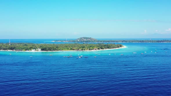 Aerial drone shot travel of relaxing resort beach lifestyle by transparent lagoon and white sand bac