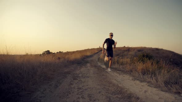 Running Man Healthy Lifestyle.Triathlete Runner Jog On Trail.Sport Recreation Fitness Run Workout 