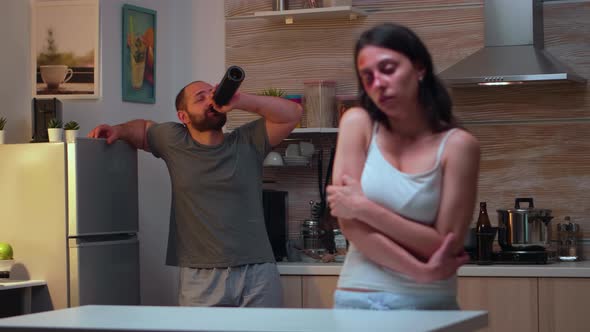 Woman Being Afraid of Drunk Husband