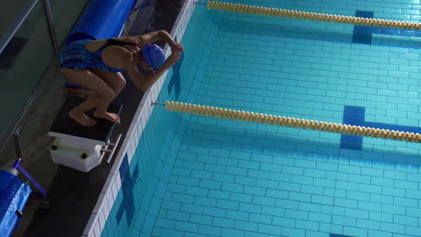 Swimmer training in a swimming pool