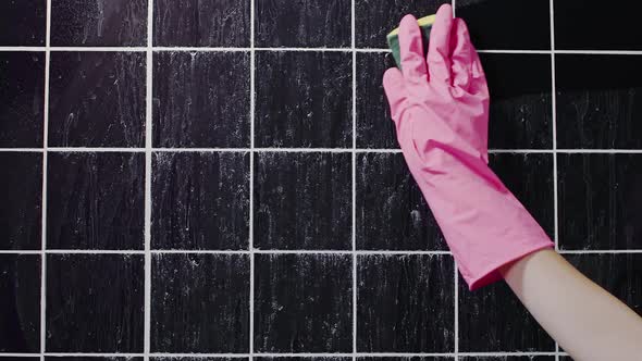 Close Up Shot of Cleaning the Dirty Tile Wall with Hand in Rubber Glove By Sponge, Commercial of