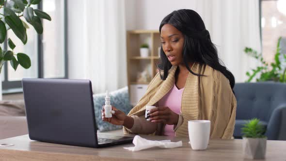 Sick Woman Having Video Call on Laptop at Home