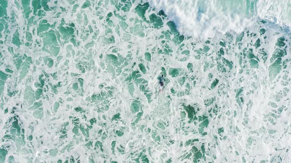 Waves Covering Surfer in Atlantic Ocean alt