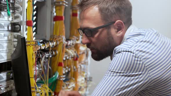 Engineer Working in Data Room