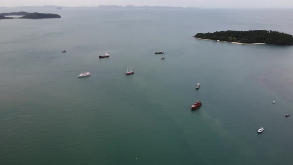 Aerial view of a beautiful bay full of luxury boats and yachts in the Andaman Sea in southern