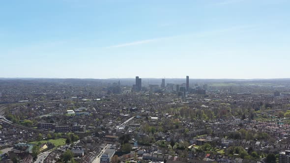 dolly forward drone shot of Croydon suburban London on a sunny day