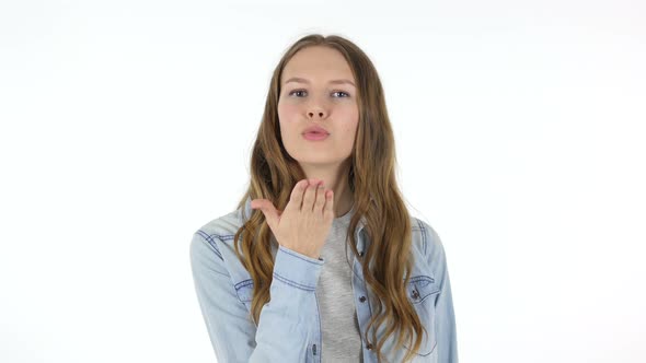 Flying Kiss by Beautiful Woman on White Background