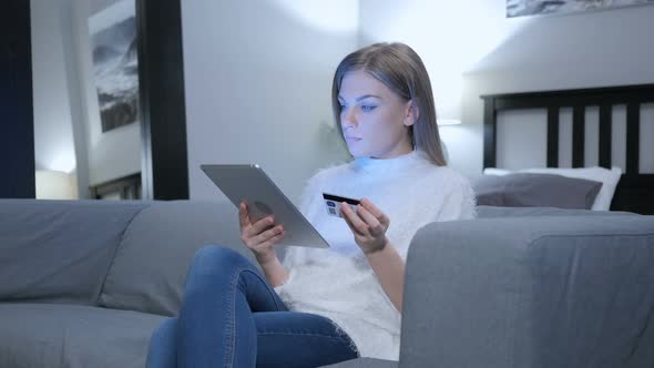 Online Shopping on Tablet PC by Young Woman