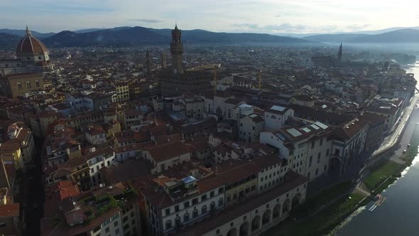 Aerial view of a city center by a river