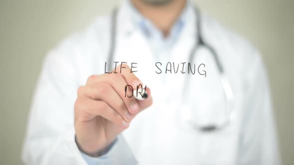 Life Saving Drugs, Doctor Writing on Transparent Screen