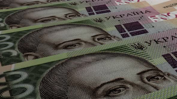 500 Ukrainian hryvnia bills background. Many banknotes.