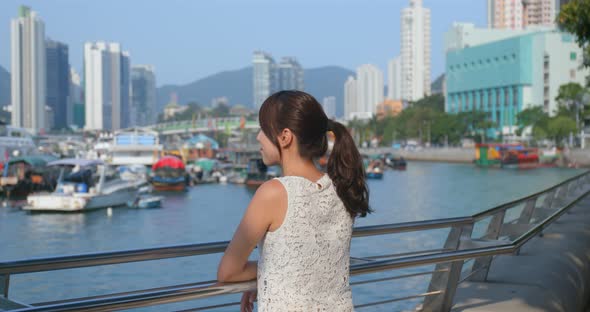 Woman Look Far Away of The Sea View in Hong Kong City