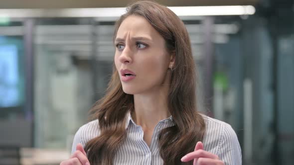 Portrait of Young Businesswoman Feeling Scared, Frightened