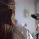 A Young Woman Dries Her Hair with an Electric Hair Dryer - VideoHive Item for Sale