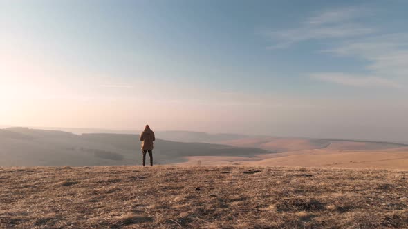 Aerial View Man Controls Shooting Drone. Beautiful View Landscape. Autumn, Caucasus, Sunset