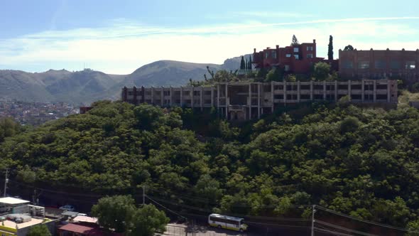 AERIAL: Guanajuato City and The Pipila, Mexico (Flying Left)