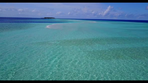 Aerial drone view travel of tranquil lagoon beach voyage by aqua blue lagoon with white sandy backgr