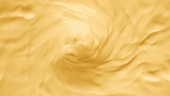 Super Slow Motion Shot of Swirling Yellow Milky Wortex at 1000Fps