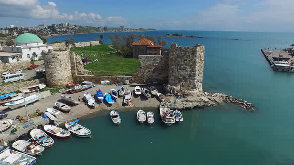 Historical Castle and Muslim Mosque on the Edge of the Small Harbor