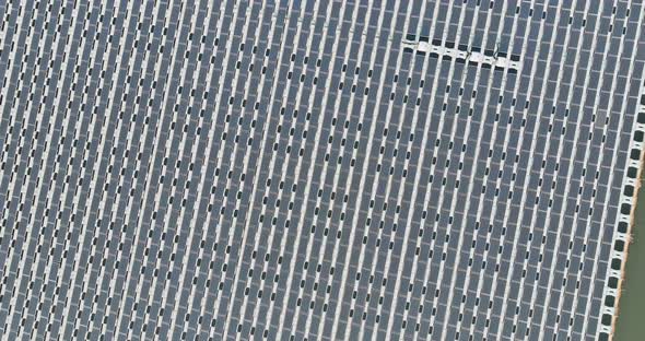 Renewable Green Solar Energy From Floating Solar Cell Panels in a Water of Aerial View