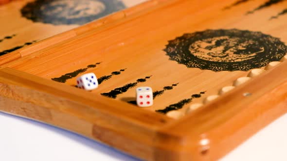 The Player Takes Six Two Dice From the Backgammon Board