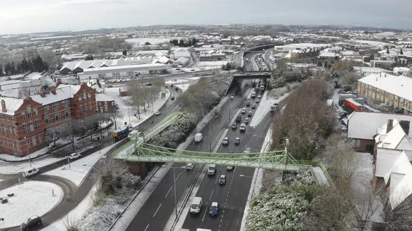 Aerial view of the A500, A50 in the city of Stoke on Trent after heavy snow fall, slow going traffic