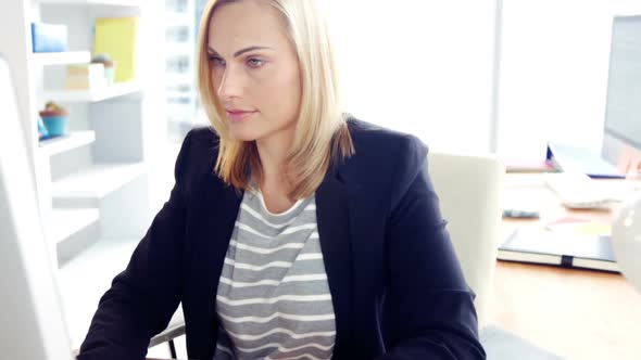 Businesswoman working on computer