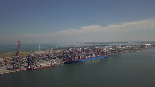 Ship with containers in the harbor of Rotterdam in the Netherlands