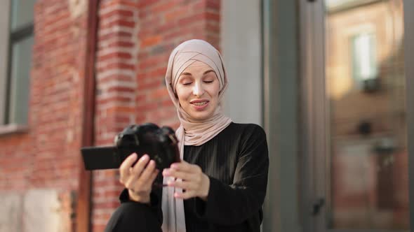 Muslim Woman Use Camera and Taking Selfie Picture