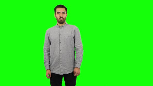 Brunette Guy Is Saying Oh My God and Being Shocked. Green Screen