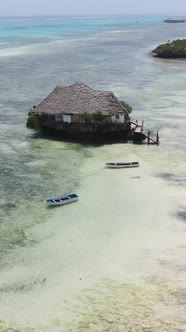 Vertical Video House on Stilts in the Ocean on the Coast of Zanzibar Tanzania