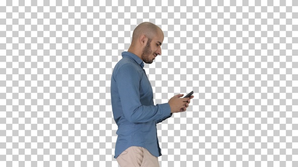 Young Man Walking and Using a Phone, Alpha Channel