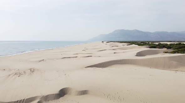 Desert dunes and the sea