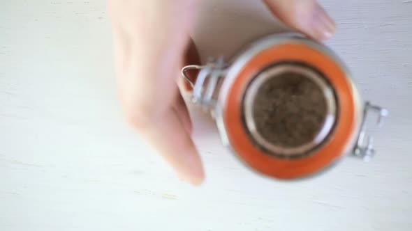 Flax seeds on painted wood board