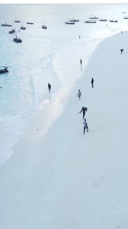 Vertical Video Boats in the Ocean Near the Coast of Zanzibar Tanzania