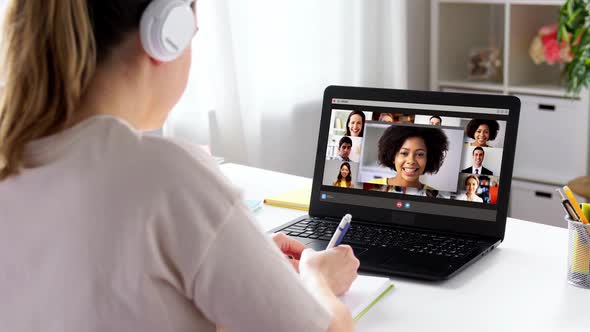 Student Woman with Laptop Having Video Conference