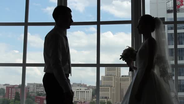 Bride and Groom Go To Each Other at the Meeting. Silhouette