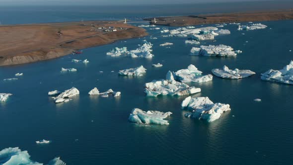 Aerial Panoramic Shot of Ice Blocks Floating on Water Surface