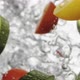 Person Throws Fresh Cut Tomatoes and Zucchini Into Water - VideoHive Item for Sale